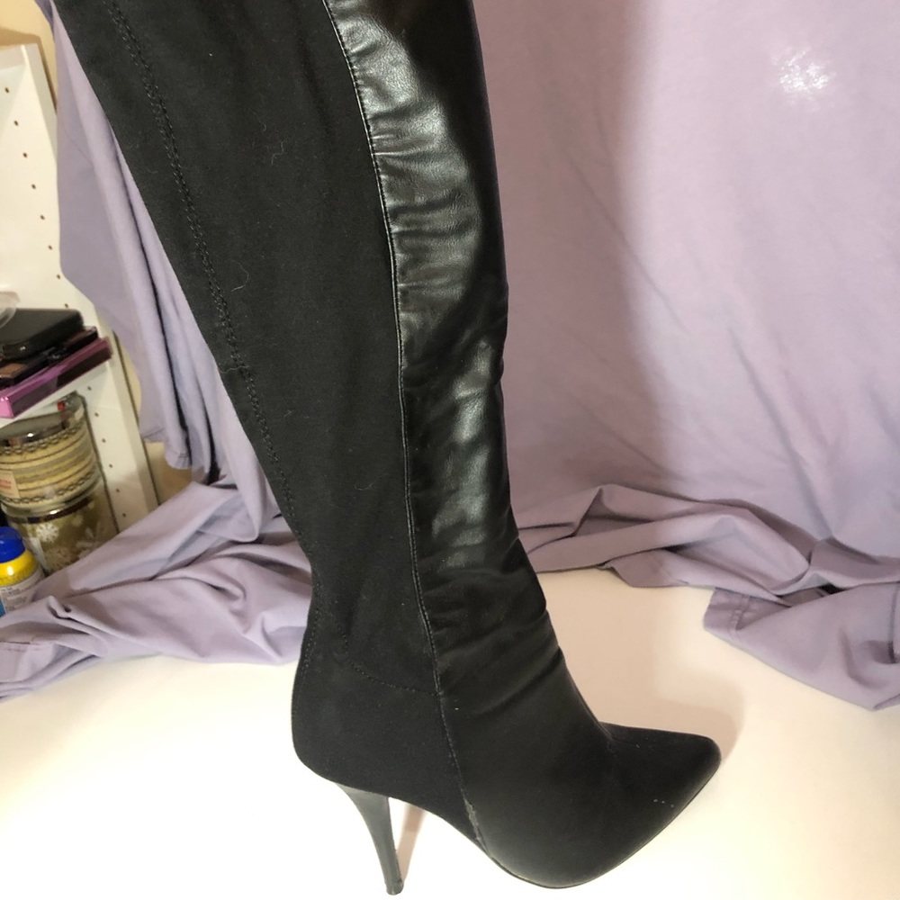 Knee high stiletto boots